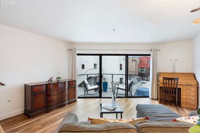 living room with light hardwood / wood-style flooring