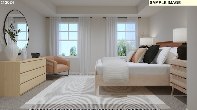 bedroom with carpet and multiple windows