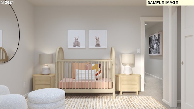 bedroom with a crib and carpet flooring