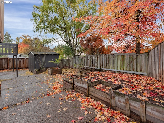 view of patio / terrace with a storage unit