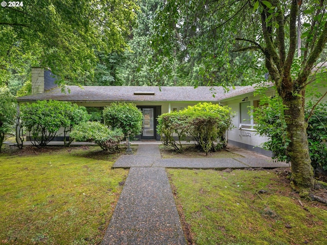 view of front of home with a front yard