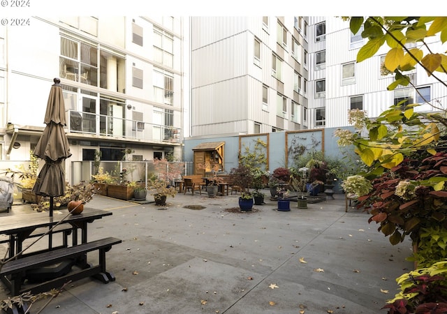 surrounding community featuring a patio area