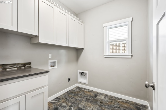 washroom with washer hookup, cabinets, and hookup for an electric dryer