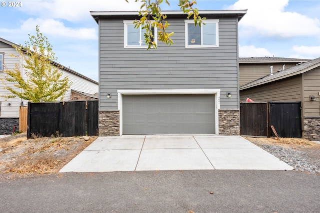 front of property with a garage