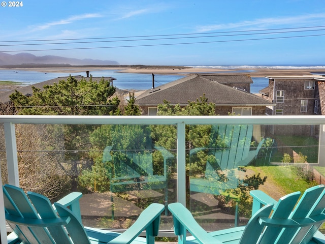 balcony with a water and mountain view