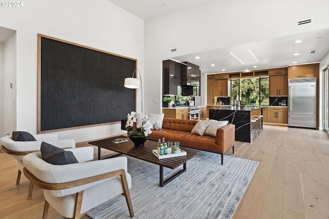 living room with light hardwood / wood-style floors