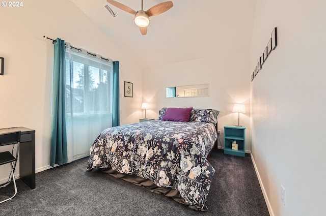 bedroom with dark colored carpet, vaulted ceiling, and ceiling fan