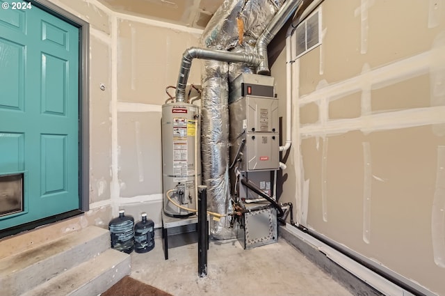 utility room with gas water heater