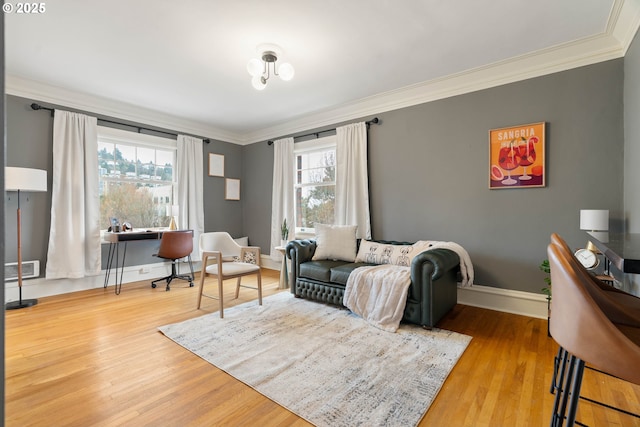 118 NW King Ave Unit 52, Portland, OR 97210 - living room with crown molding, wood finished floors, and baseboards