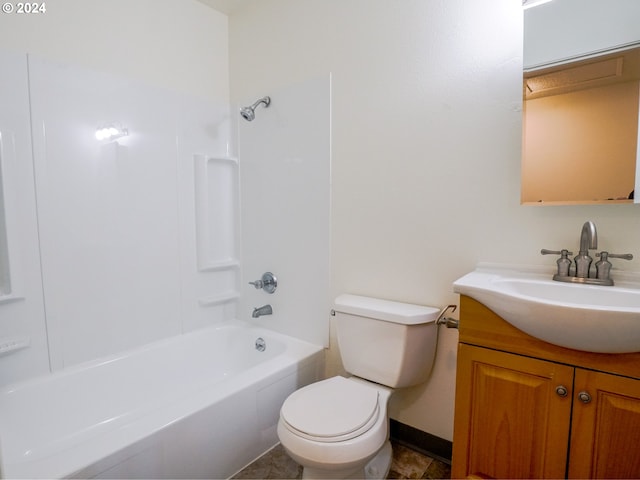 full bathroom featuring toilet, tile floors, vanity, and bathing tub / shower combination