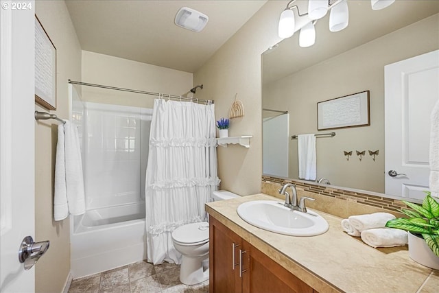 full bathroom featuring vanity, decorative backsplash, shower / bath combination with curtain, and toilet