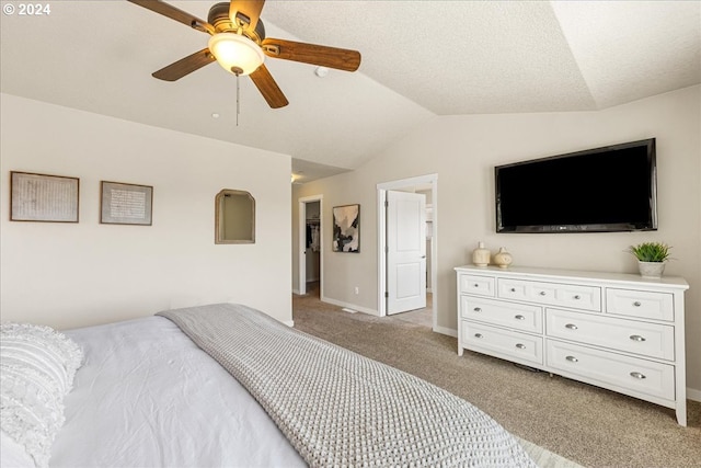 bedroom featuring lofted ceiling, light colored carpet, and ceiling fan