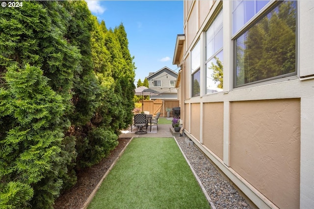 view of yard with a patio area