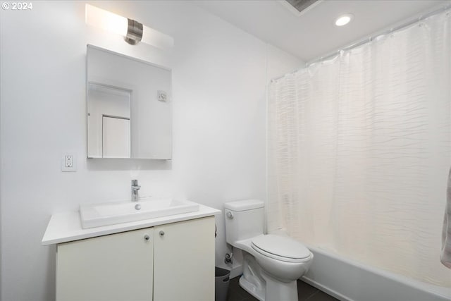 full bathroom with tile patterned flooring, vanity, shower / bath combination with curtain, and toilet