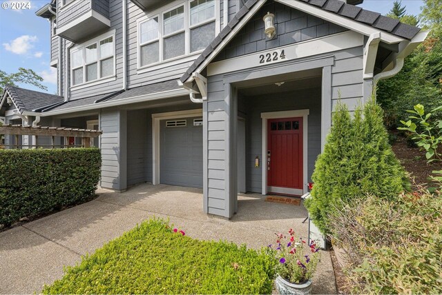 entrance to property featuring a garage