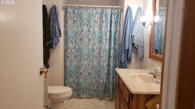 bathroom with a shower with curtain, vanity, and toilet