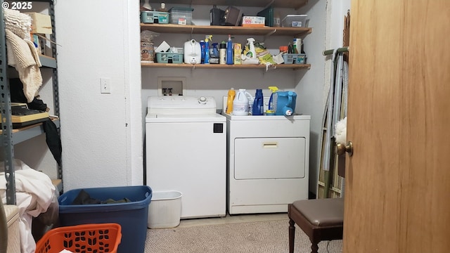 laundry area featuring washing machine and dryer