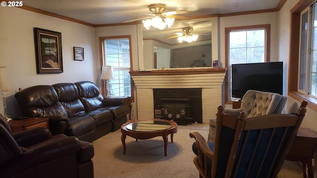 living room with a wood stove, light carpet, crown molding, and ceiling fan