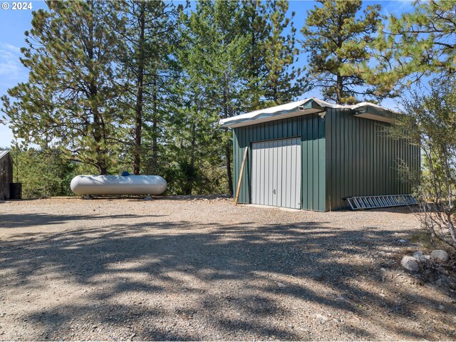 view of outbuilding featuring a garage