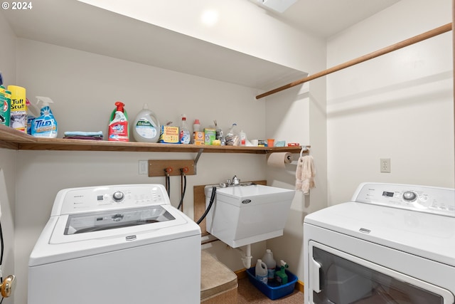 laundry area featuring sink and independent washer and dryer