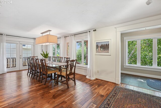 kitchen featuring white cabinets, sink, dark hardwood / wood-style floors, decorative backsplash, and appliances with stainless steel finishes