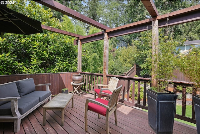 wooden deck featuring an outdoor living space