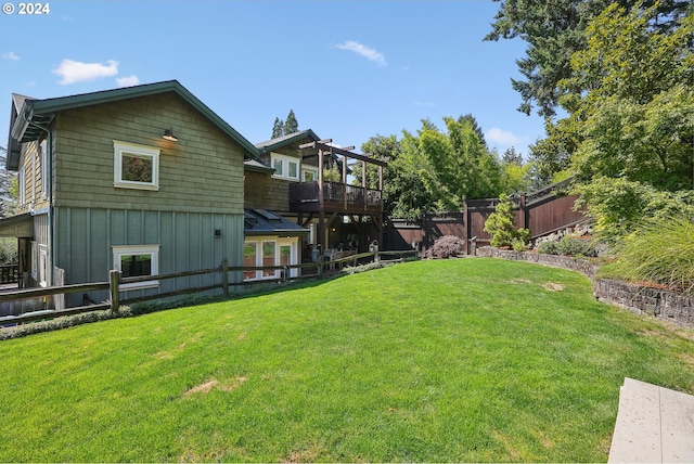 view of yard featuring a deck