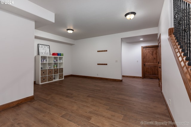 unfurnished room featuring dark hardwood / wood-style floors