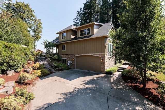 craftsman house with a garage