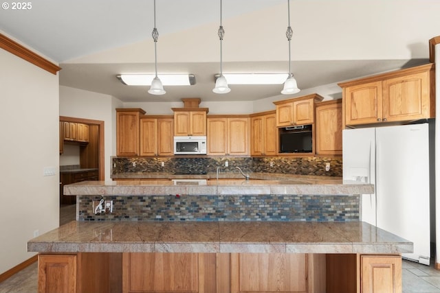 kitchen with vaulted ceiling, decorative backsplash, decorative light fixtures, and white appliances