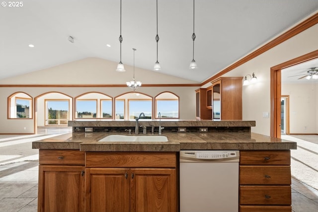 kitchen with dishwasher, sink, hanging light fixtures, a center island with sink, and ceiling fan with notable chandelier