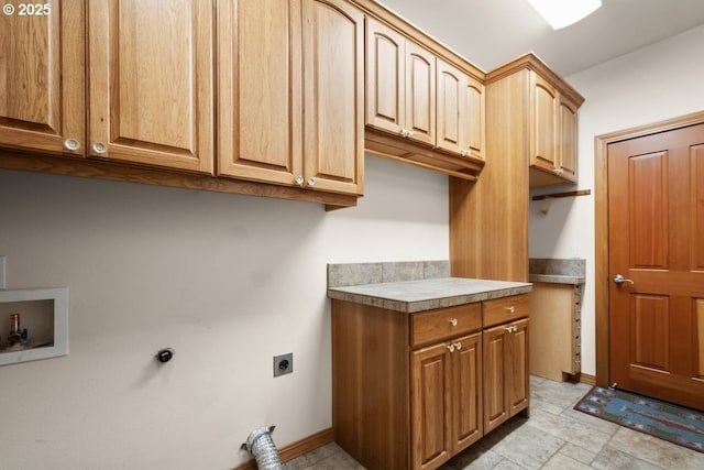 laundry area featuring cabinets, hookup for a washing machine, and electric dryer hookup