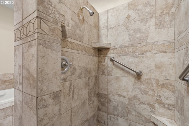 details featuring tiled shower