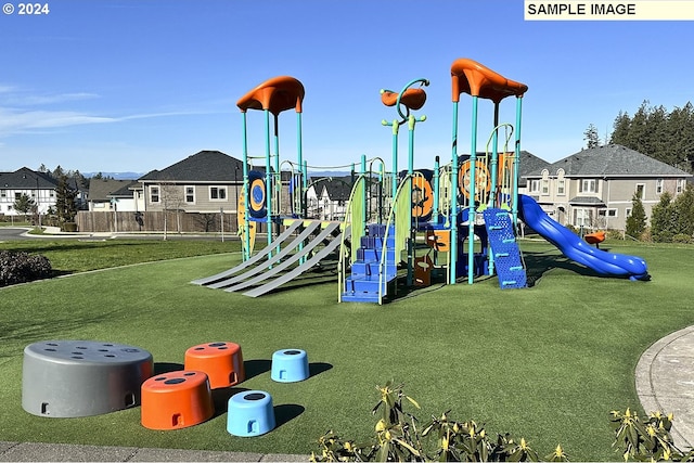 view of playground featuring a yard