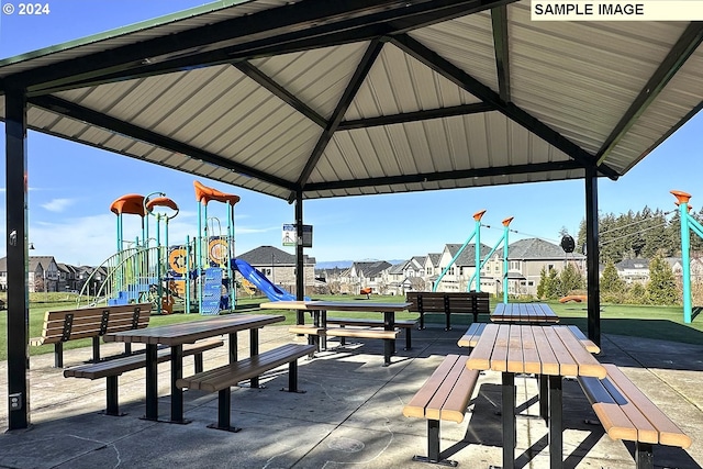 view of community with a gazebo and a playground