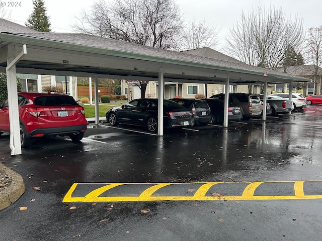 view of car parking featuring a carport