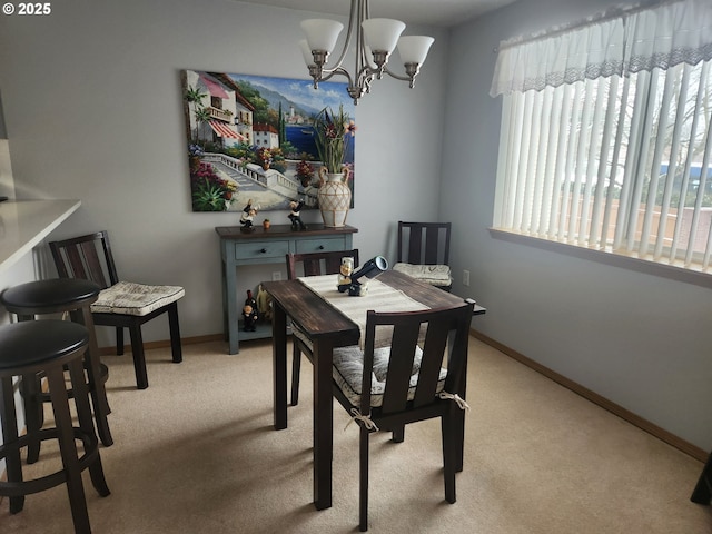 carpeted dining room with a notable chandelier