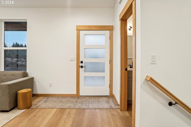 doorway featuring hardwood / wood-style flooring