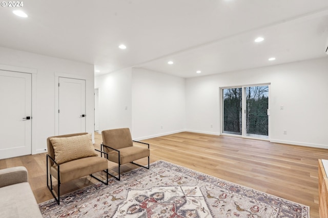 sitting room with light hardwood / wood-style floors