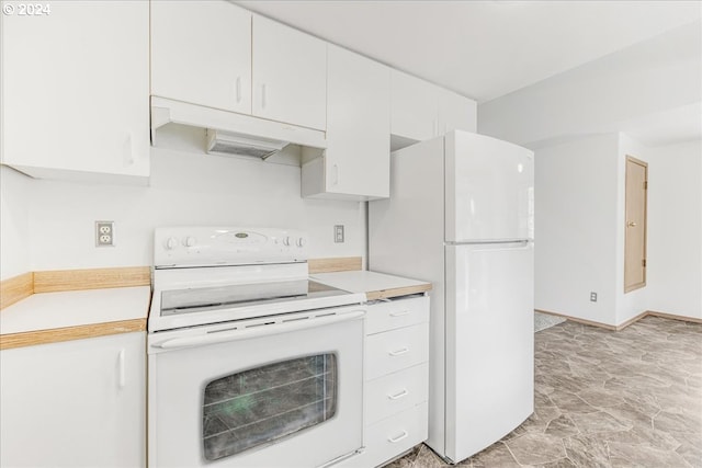 kitchen with white appliances and white cabinetry