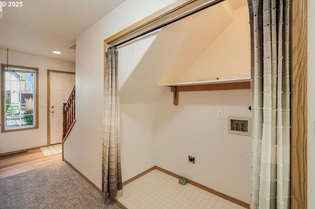 laundry area with washer hookup, light colored carpet, and electric dryer hookup