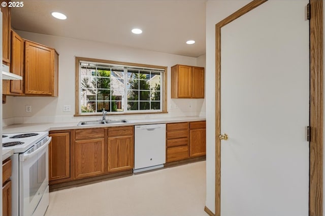 kitchen featuring sink and white appliances