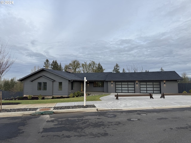 single story home featuring a garage