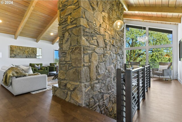 living room with dark wood-type flooring, beamed ceiling, wood ceiling, and high vaulted ceiling