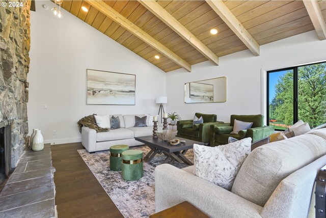 living room with a fireplace, wood ceiling, dark wood-type flooring, and high vaulted ceiling