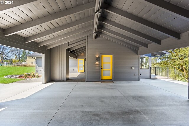 exterior space with a carport