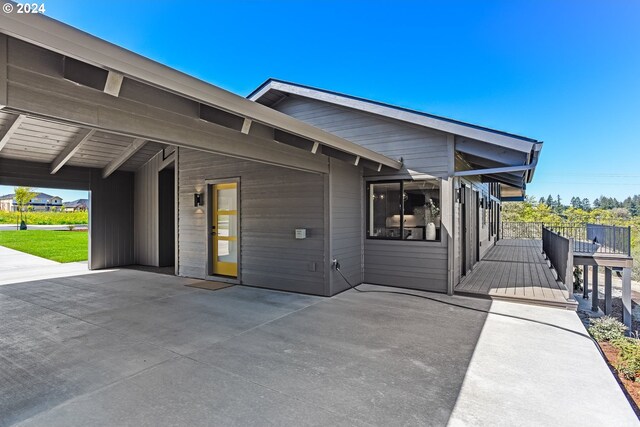 exterior space featuring a carport