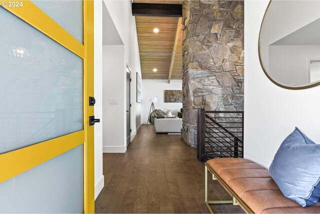 hallway featuring dark hardwood / wood-style flooring and wood ceiling