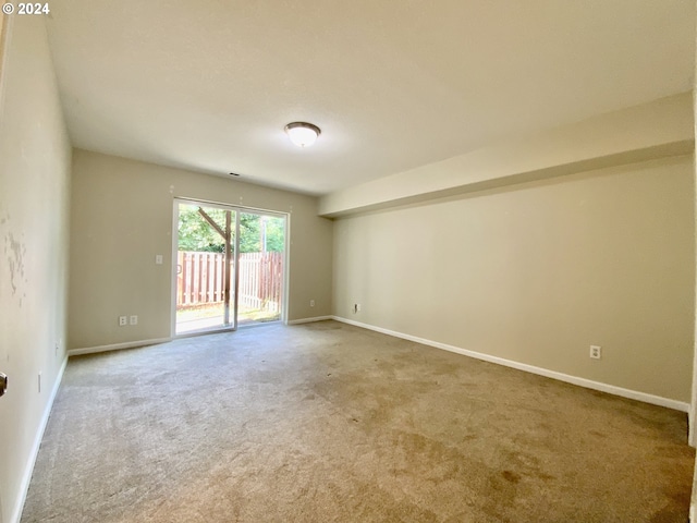 empty room featuring carpet flooring