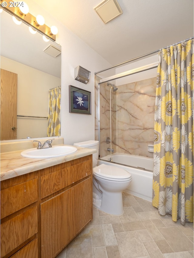 full bathroom featuring vanity, shower / bath combo, and toilet